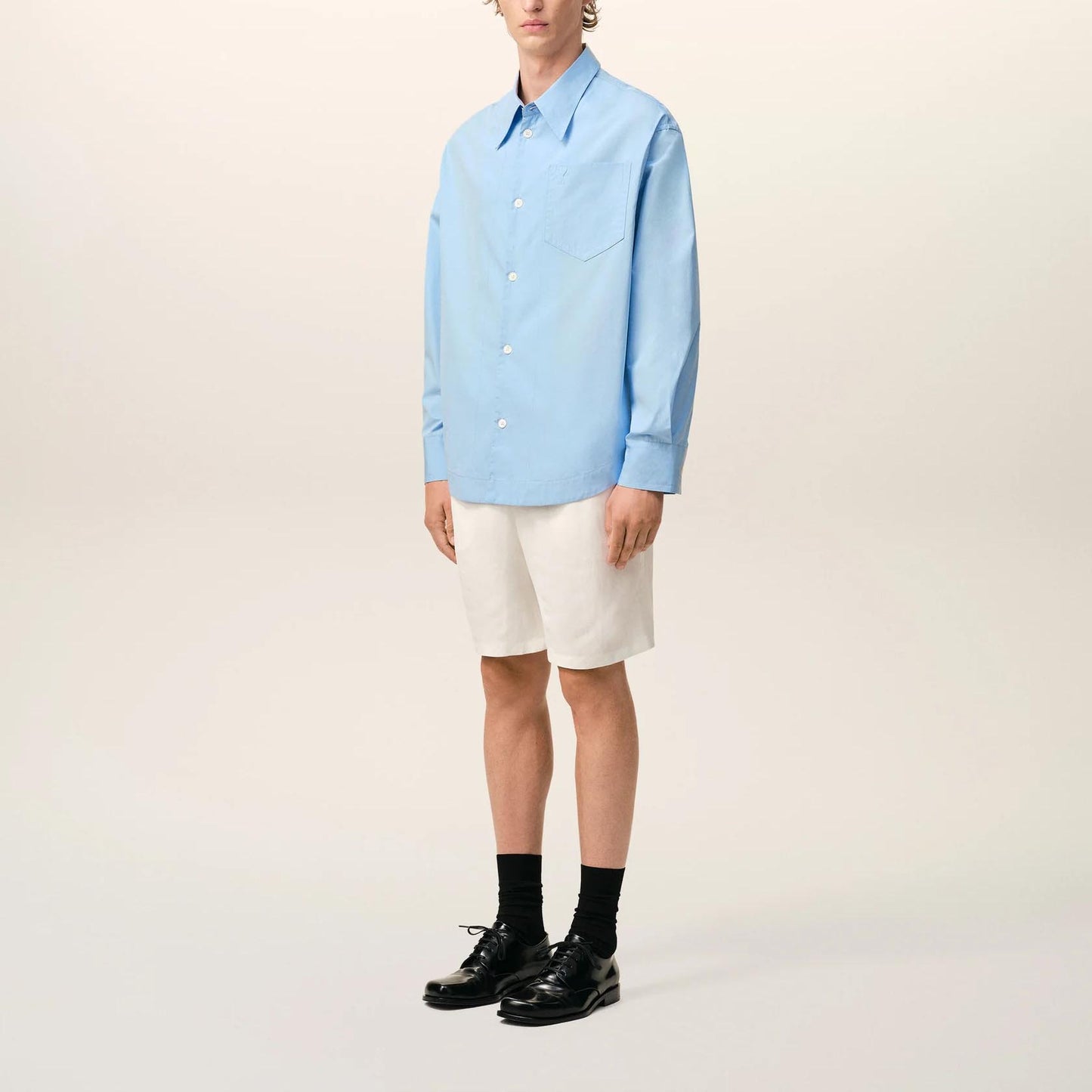 AMI Paris Long Sleeve Wide Shirt With Sharp Collar And Embossed Ami De Coeur USH808.CO0063