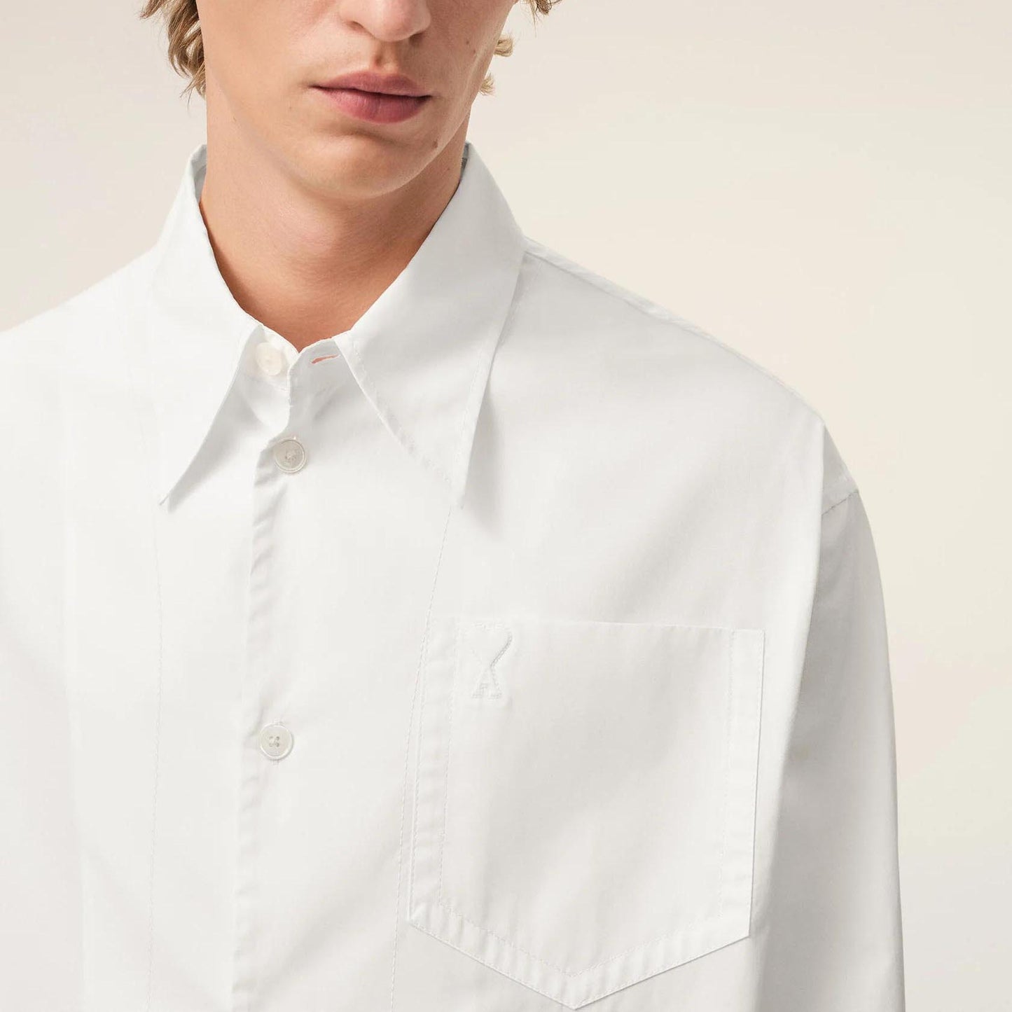 AMI Paris Long Sleeve Wide Shirt With Sharp Collar And Embossed Ami De Coeur USH808.CO0063