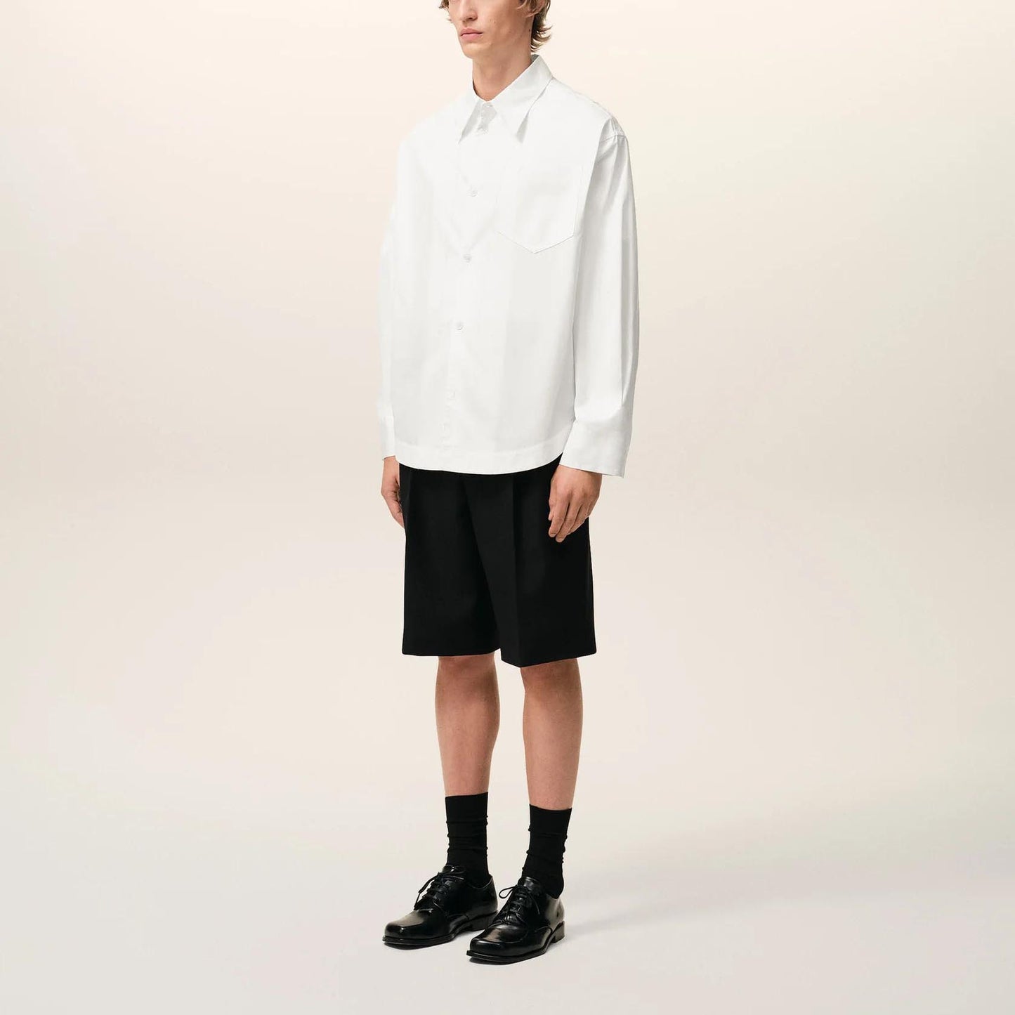 AMI Paris Long Sleeve Wide Shirt With Sharp Collar And Embossed Ami De Coeur USH808.CO0063
