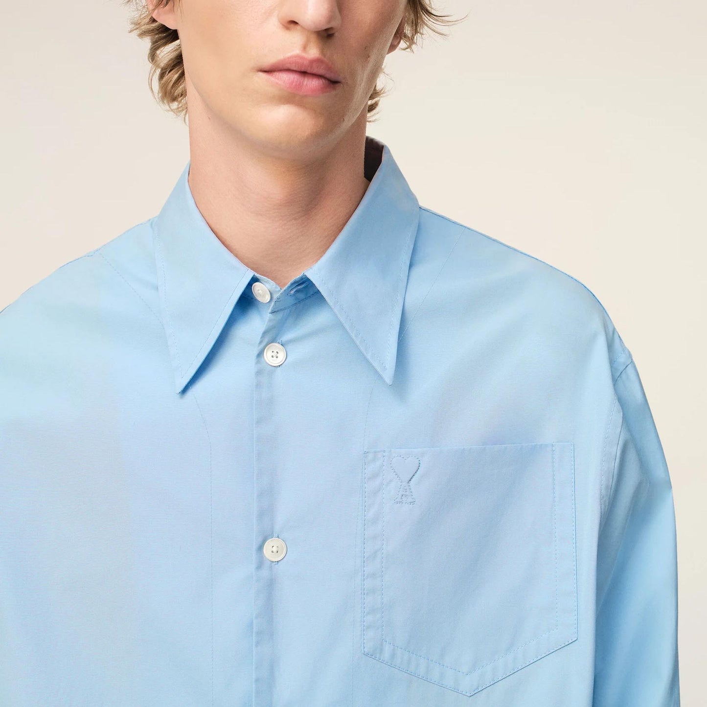 AMI Paris Long Sleeve Wide Shirt With Sharp Collar And Embossed Ami De Coeur USH808.CO0063