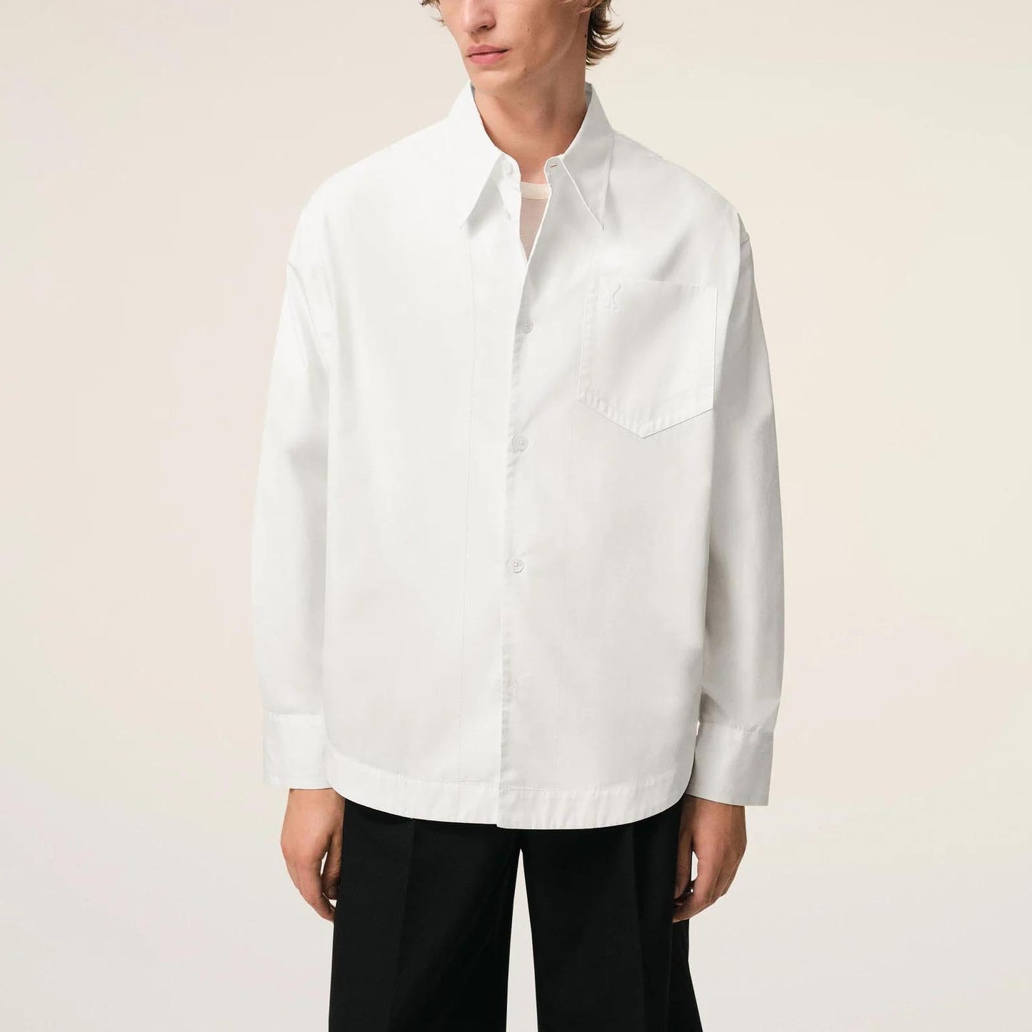 AMI Paris Long Sleeve Wide Shirt With Sharp Collar And Embossed Ami De Coeur USH808.CO0063